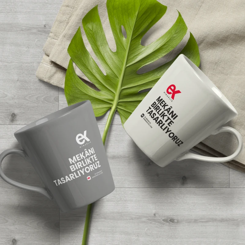 Mekânı birlikte tasarlıyoruz yazılı gri ve beyaz ek Mimarlık kupaları